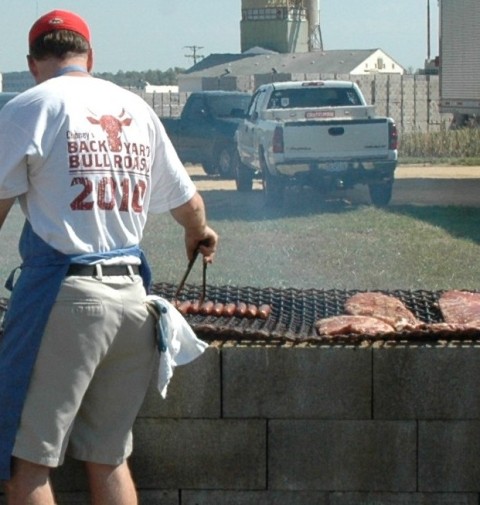 One of the “Pit Crew” watches over the barbeque during the 2010 Chaney’s Back Yard Bull Roast held at Chaney Enterprises Waldorf Mix Plant.